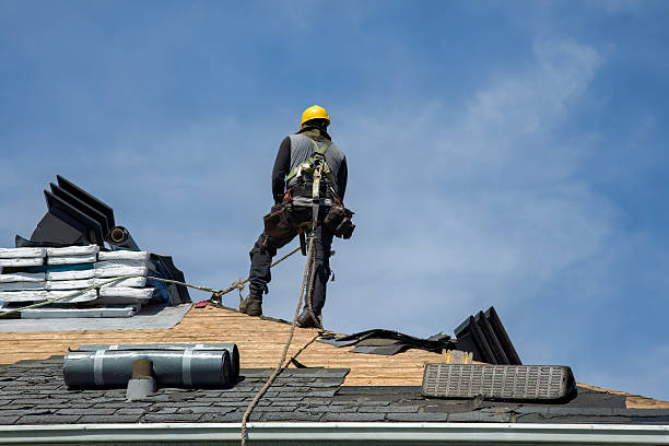 Professional Roofing technician working in Durand, MI